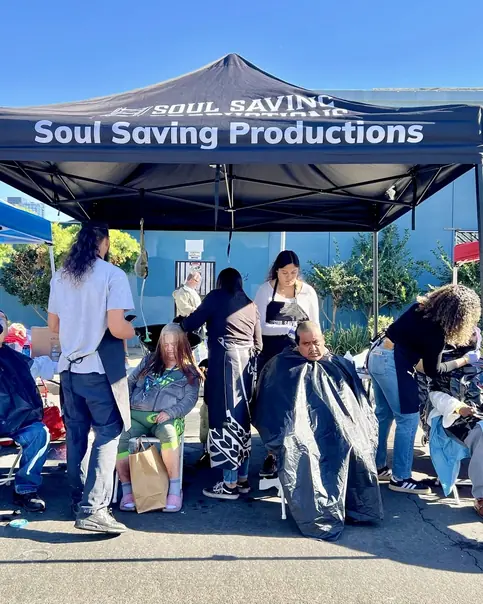 Volunteers distributing supplies during a Soul Saving Productions outreach