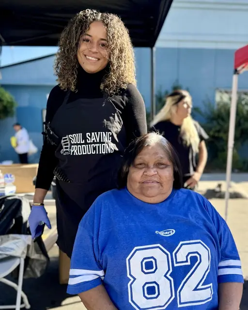 Community members gathered at a Soul Saving Productions outreach event
