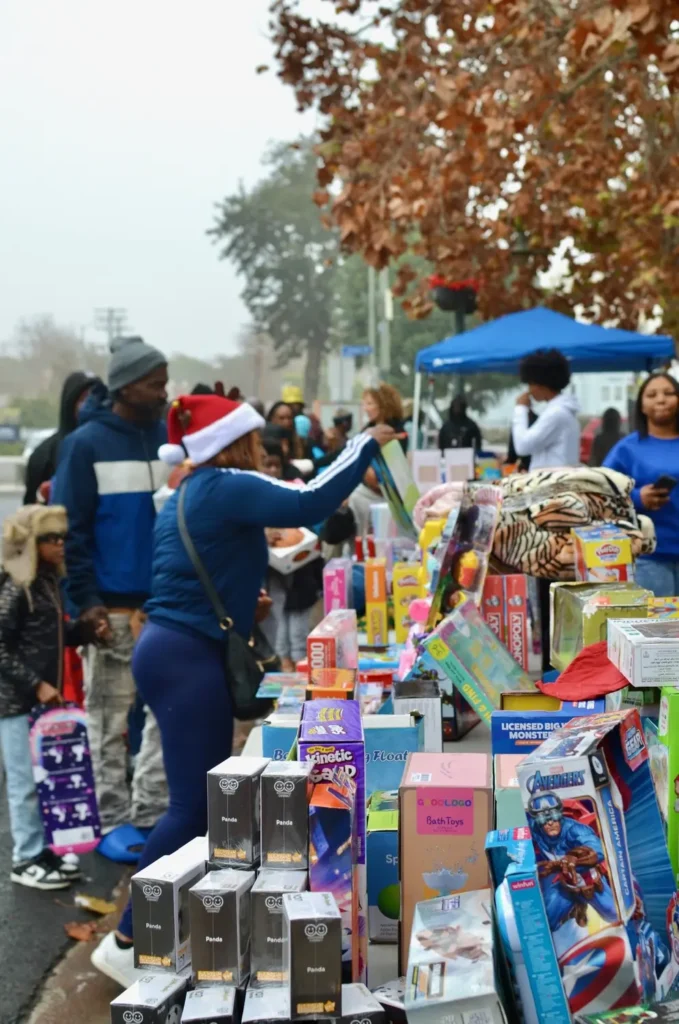 Volunteers and community members gathered at a Soul Saving Productions event