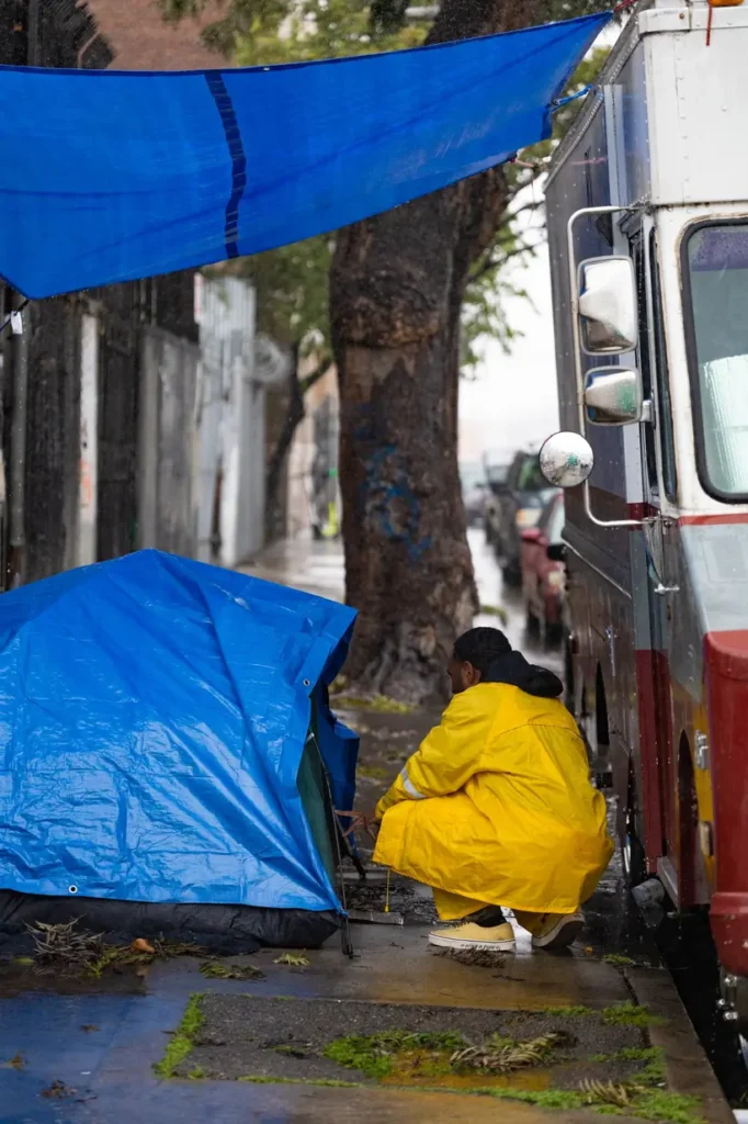 Soul Saving Productions volunteer providing dignity-centered care to a community member